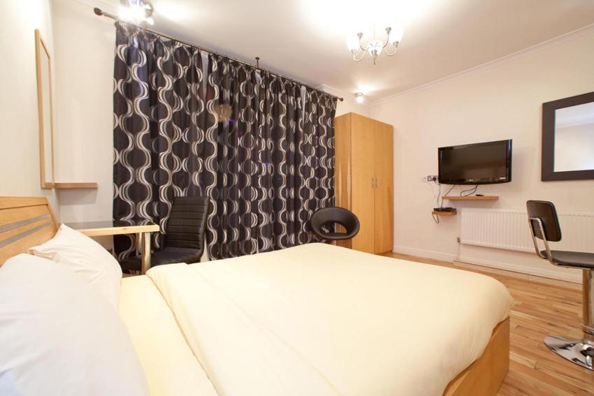 Milestone Apartments Londres Quarto foto